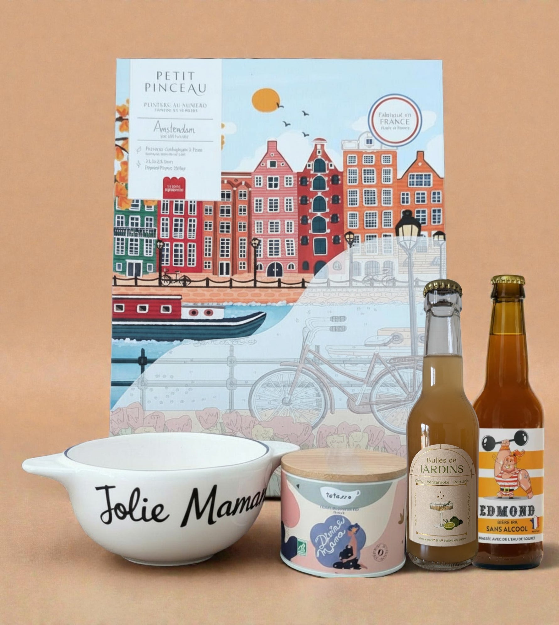 Box futures mamans: bol breton avec écrit jolie maman, une tisane de grossesse, un pétillant sans alcool, une bière sans alcool et un kit de peinture aux numéros.